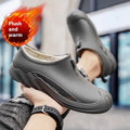 Men's short plastic rain boots in ankle-height wellington style available in multiple colours
