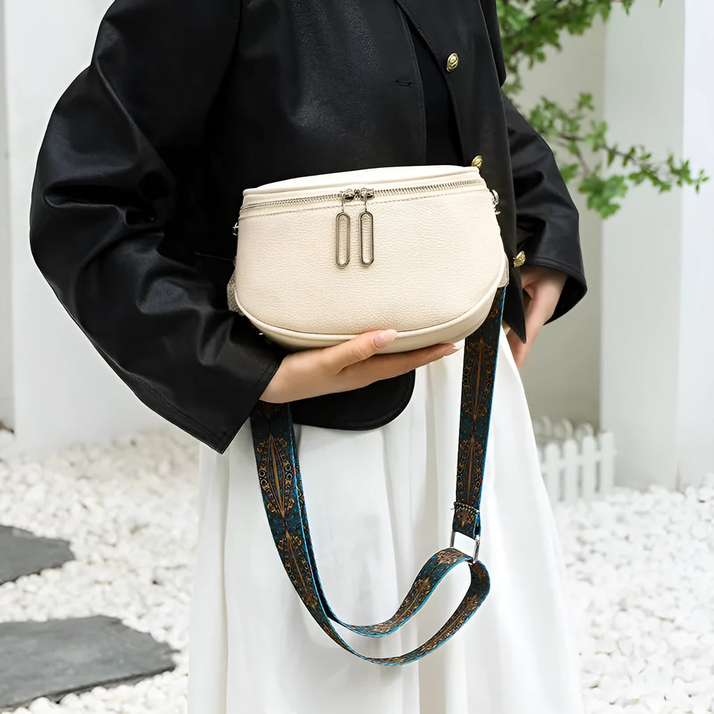 Women's soft PU leather messenger bag in saddle shape design with single shoulder strap