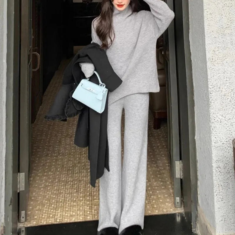 Women's casual long sleeve sweater and wide leg trousers two-piece set in solid colour.