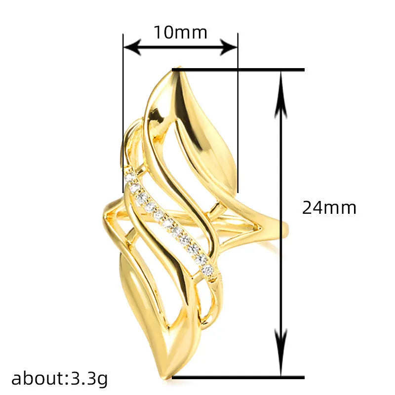 Women's copper ring with exaggerated curved design and gold-coloured finish showing side profile