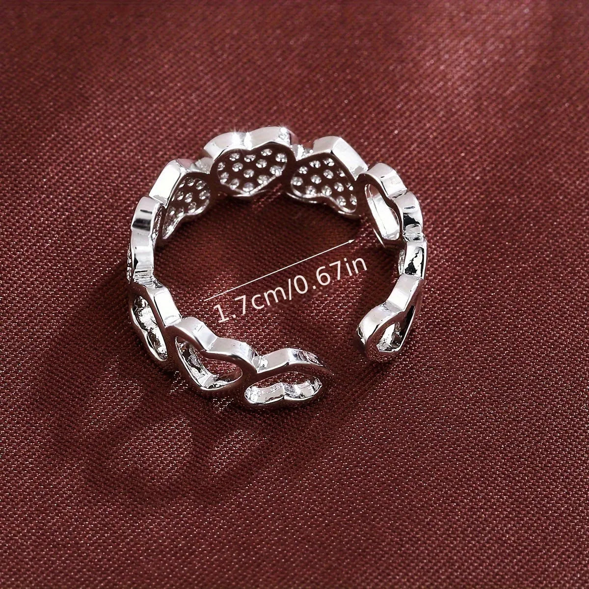 Adjustable couples opening ring with geometric heart design in gold and silver colour options