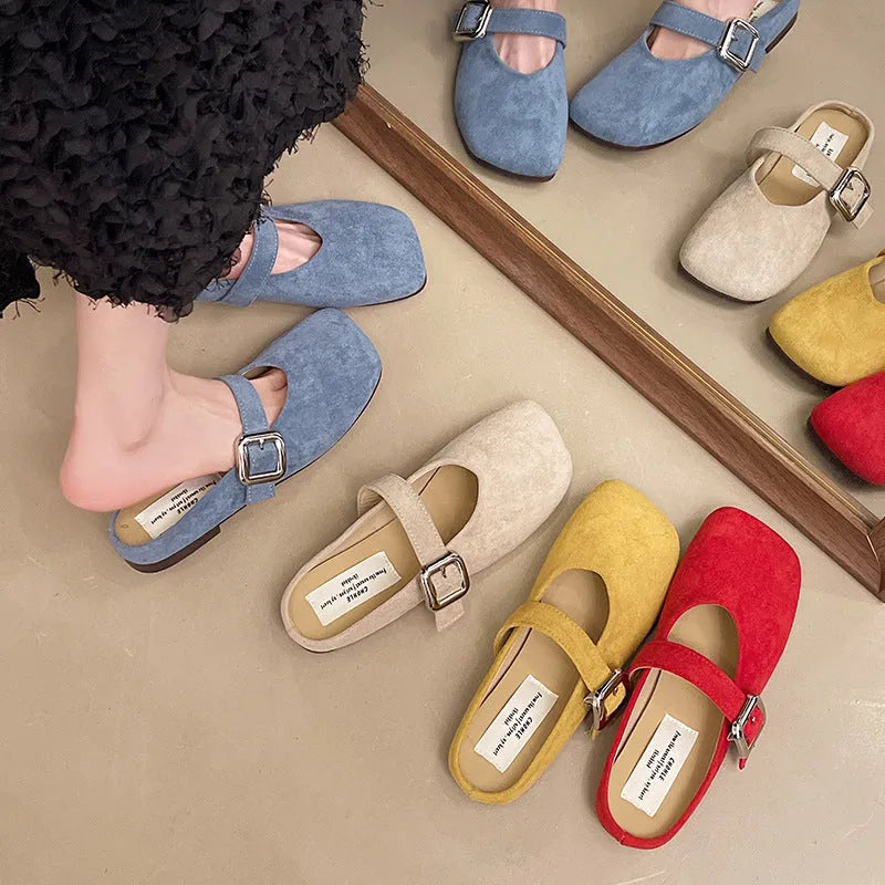 Women's flat half slipper in apricot colour with square toe and rubber sole.