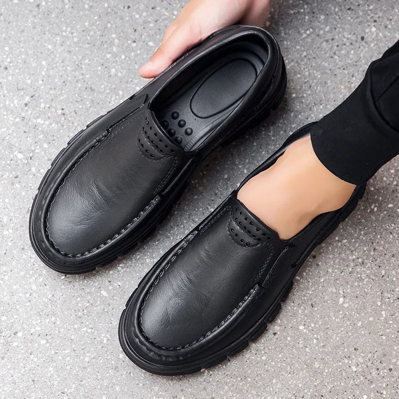 Men's black slip-on work shoes with artificial leather uppers and platform heel design