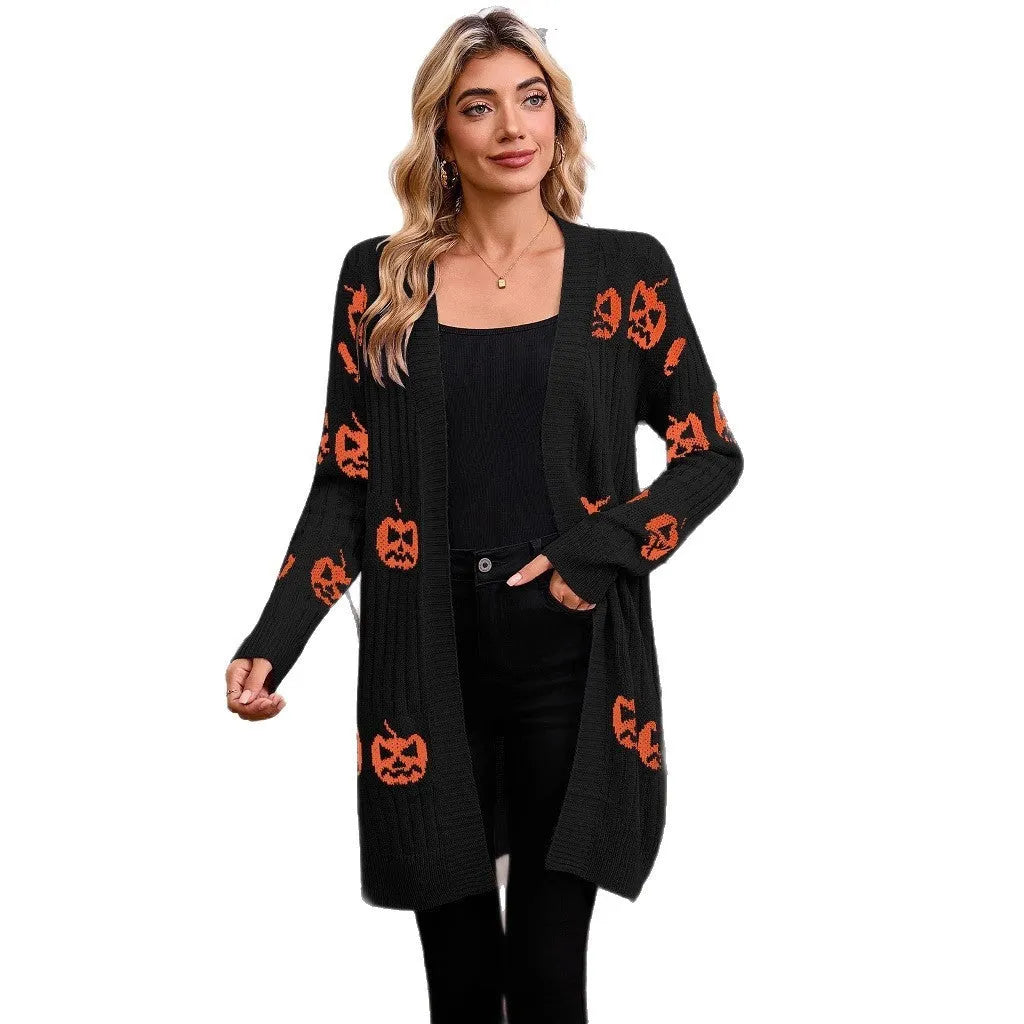 Women's black Halloween cardigan with orange pumpkin head jacquard knitting.