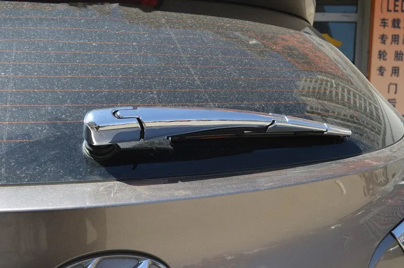Silvery ABS plastic rear wiper cover trim for a 2010 Hyundai car.