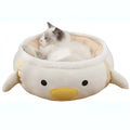 Green chick-shaped cat bed shown both flat and hanging as a hammock, for small pets.