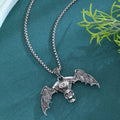 Gothic dark skull alloy necklace with skeleton wing pendant on display