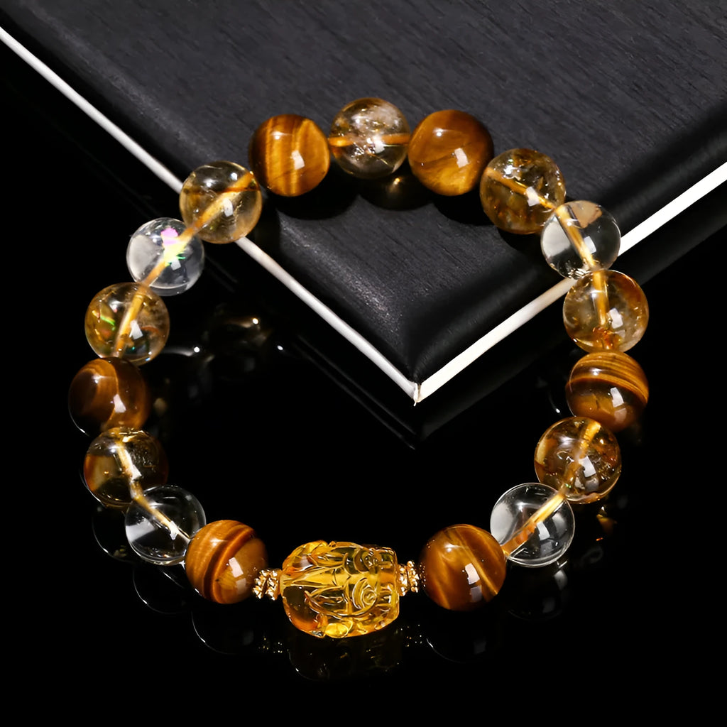 Yellow tiger's eye and citrine gemstone bracelet with 10mm round beads and a silver steel Pi Xiu charm.