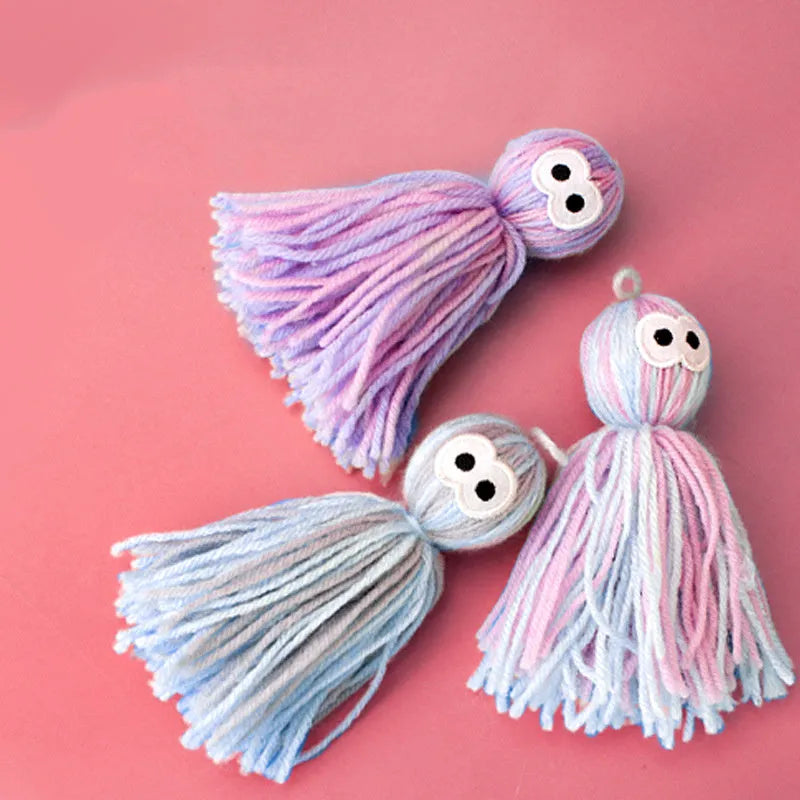 Wool ball cat toy hanging with blue grey colour and 10cm dimensions for teeth grinding play