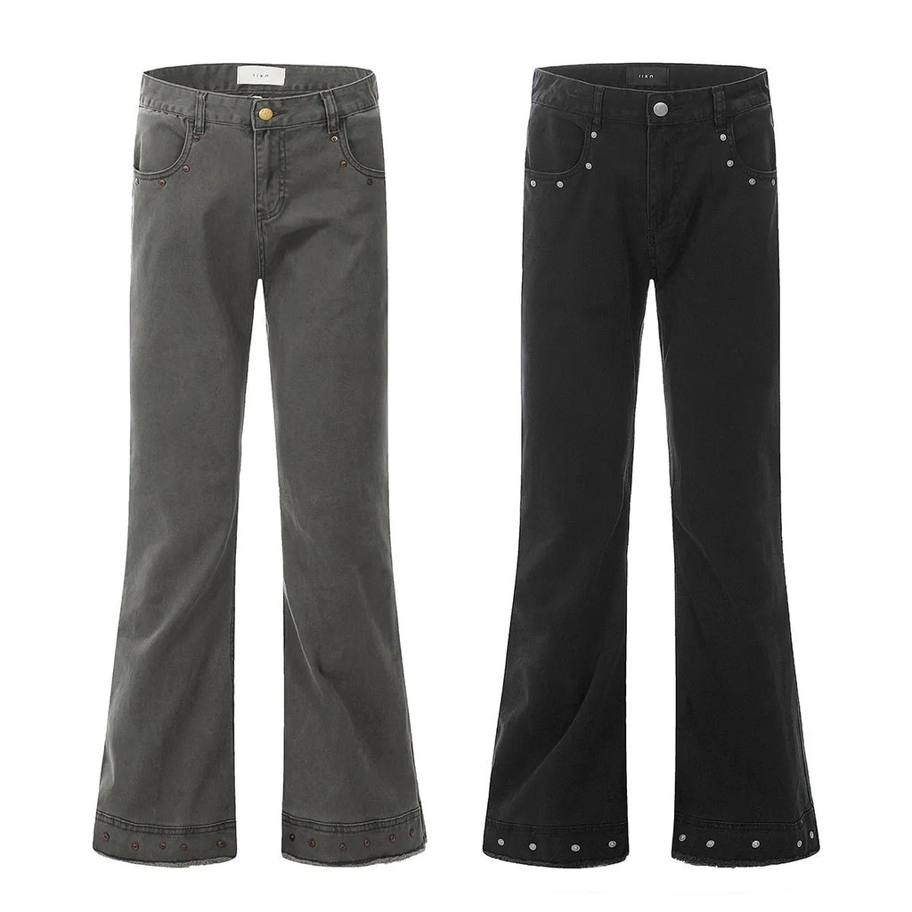 Straight-leg skinny jeans in black cotton fabric with horn-style leg opening and zipper fly