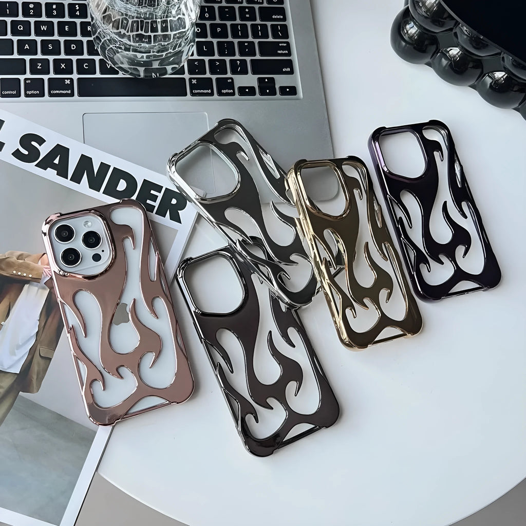 Electroplated hollow flame pattern soft TPU phone case for Apple iPhone on a table.