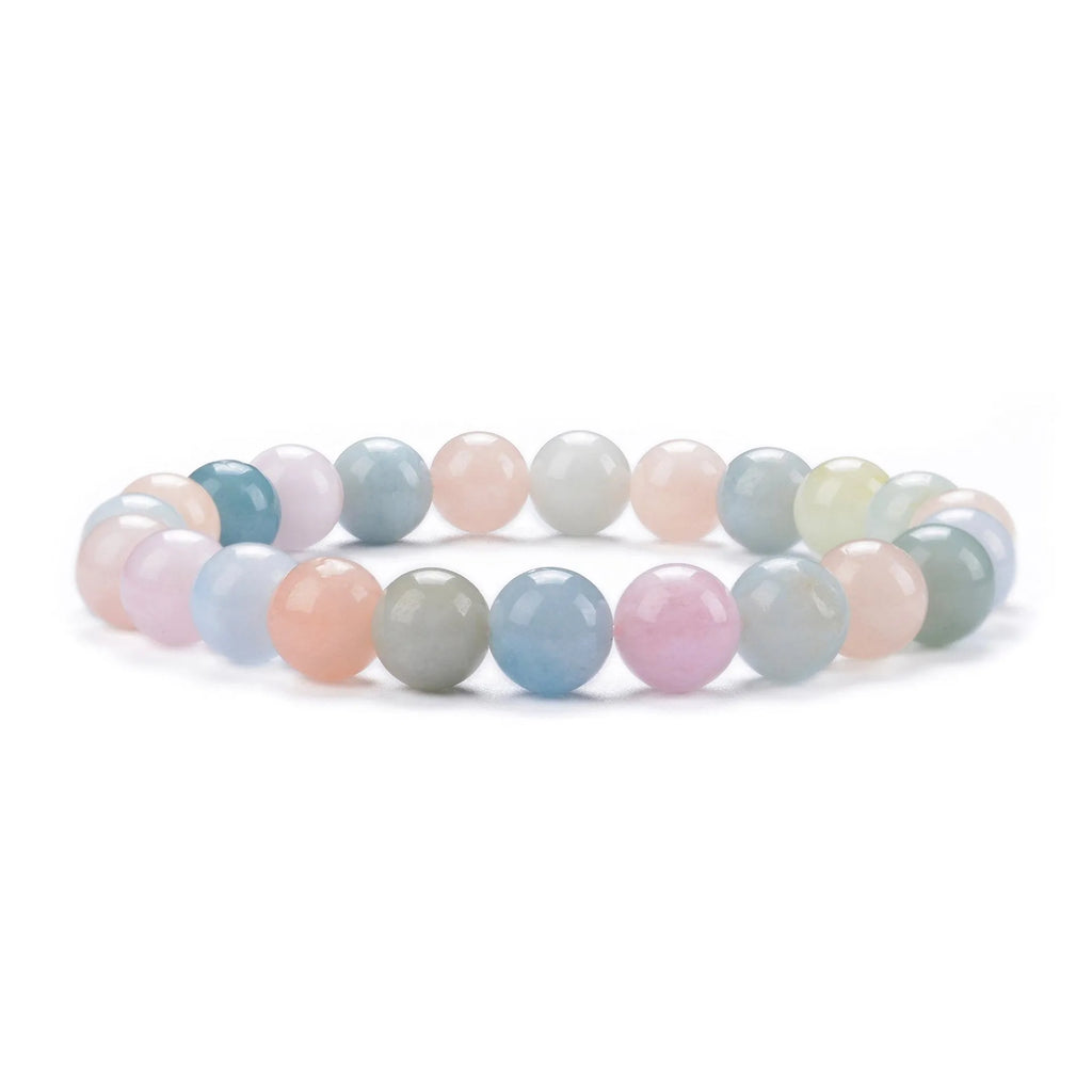 Close-up of a handmade bracelet with round 8mm agate beads in various natural stone colours on a wrist.
