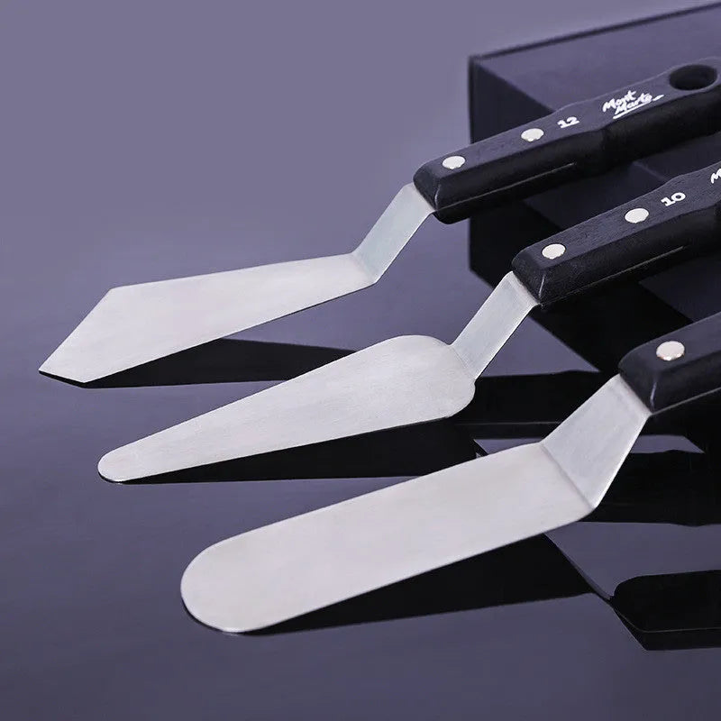 Three stainless steel palette knives for painting with No. 3, No. 10, and No. 12 profiles