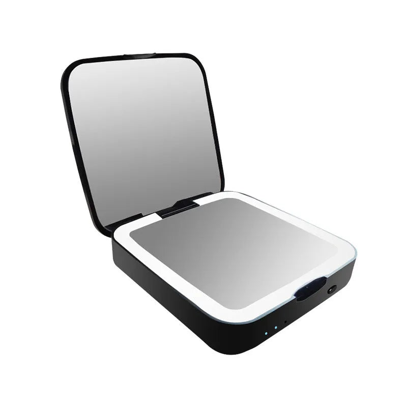 Black and white lighted makeup mirror with 4x magnification panel, HD mirror, and adjustable LED lights.