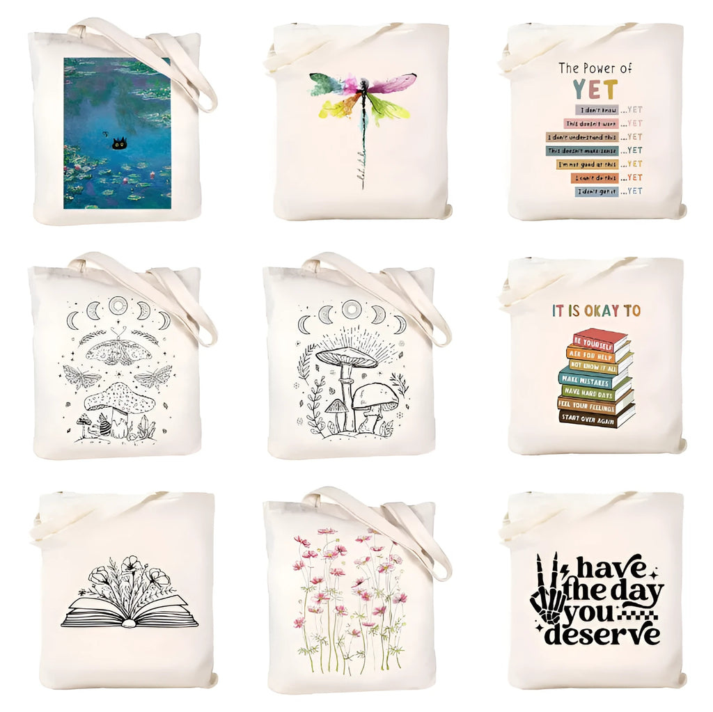 White canvas hand shopping bag with Halloween digital print, 34 by 42 centimetres, on plain background