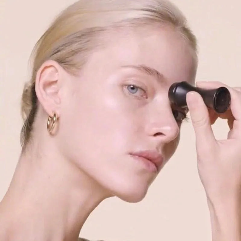 Volcanic stone portable reusable face roller for oily skin control in black, green, pink, or white.