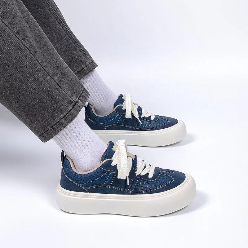 Men's black platform casual shoes with thick sole and lace-up front closure