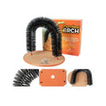 White plastic arched cat grooming toy with built-in brush bristles for scratching.