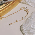 A natural pearl set in a gold-plated bracelet for women.