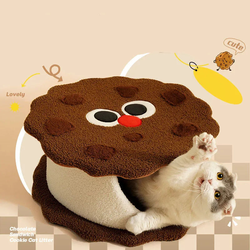 Khaki coloured enclosed cat house shaped like sandwich cookie with removable cushion for winter sleeping