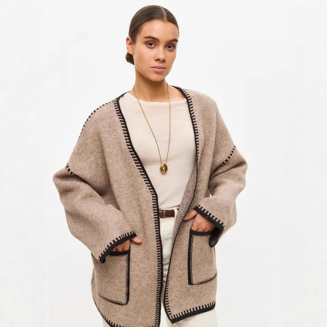 White lace-up knitted cardigan sweater coat with long sleeves and mid-length design