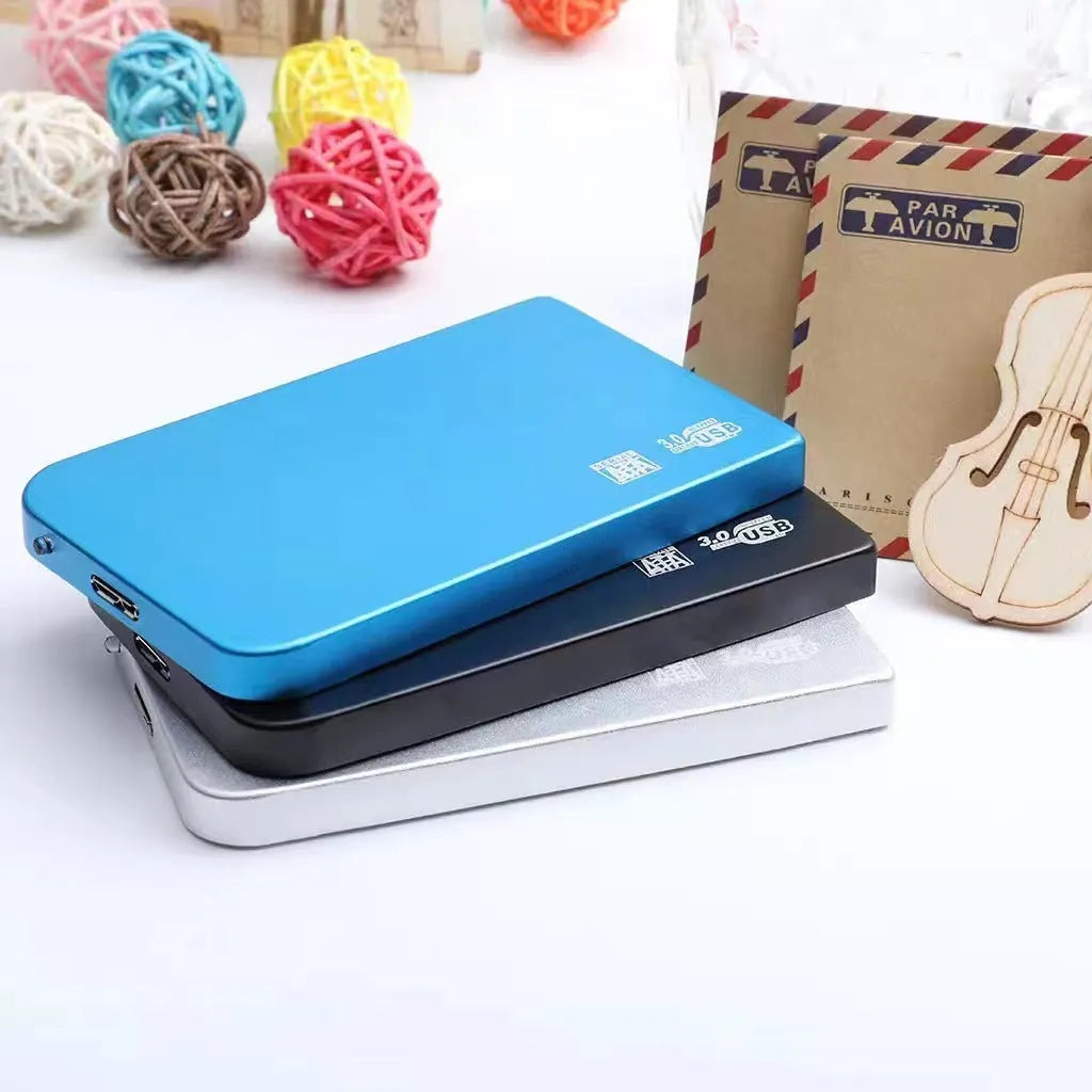 Silver USB 3.0 solid state external hard drive with metal shell and data cable
