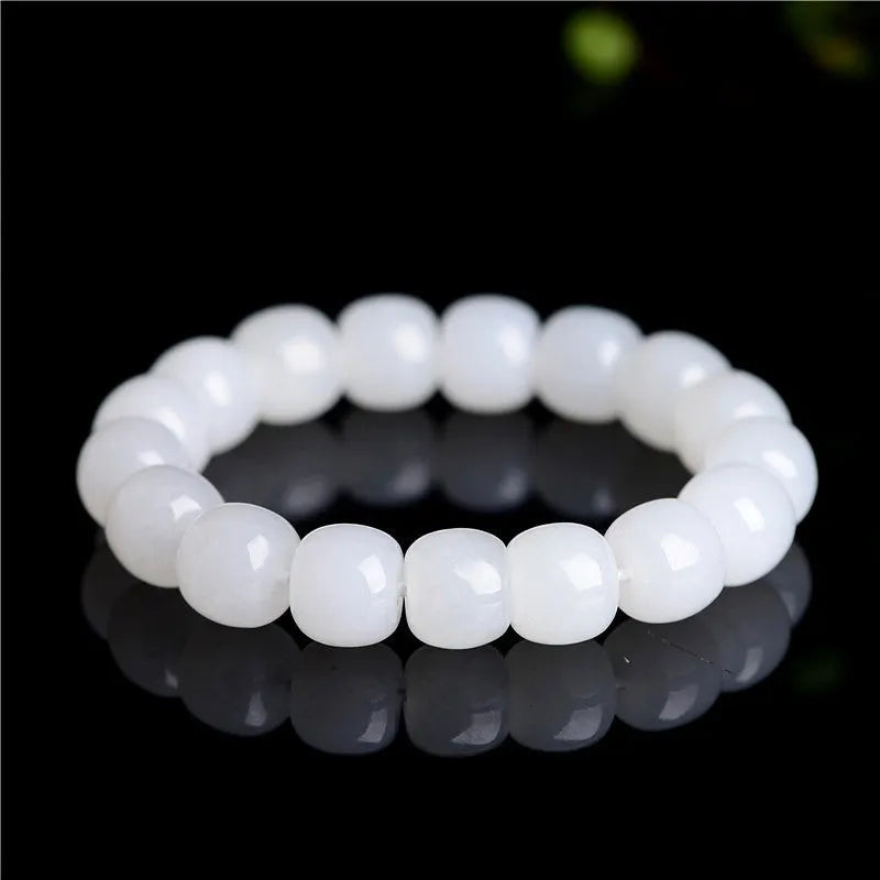 White Hetian jade barrel bead bracelet showing three size options: 5x6mm, 7x8mm, and 8x10mm on a neutral background.
