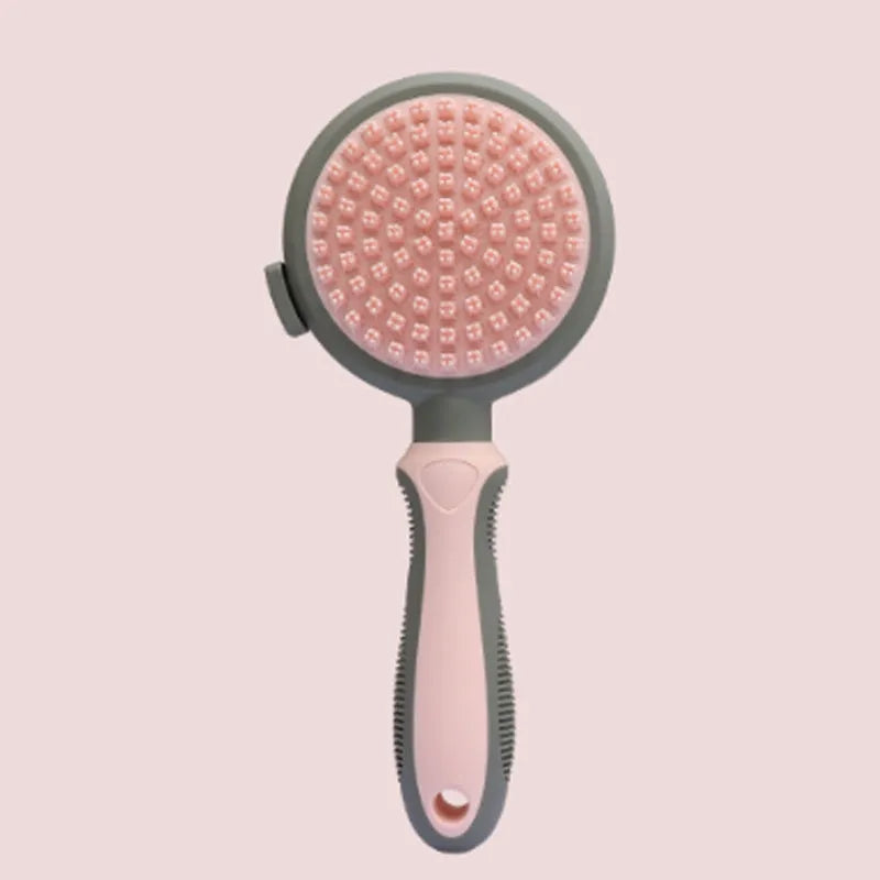 Green and pink dual-sided pet brush showing retractable slicker brush and silicone massager on a white background
