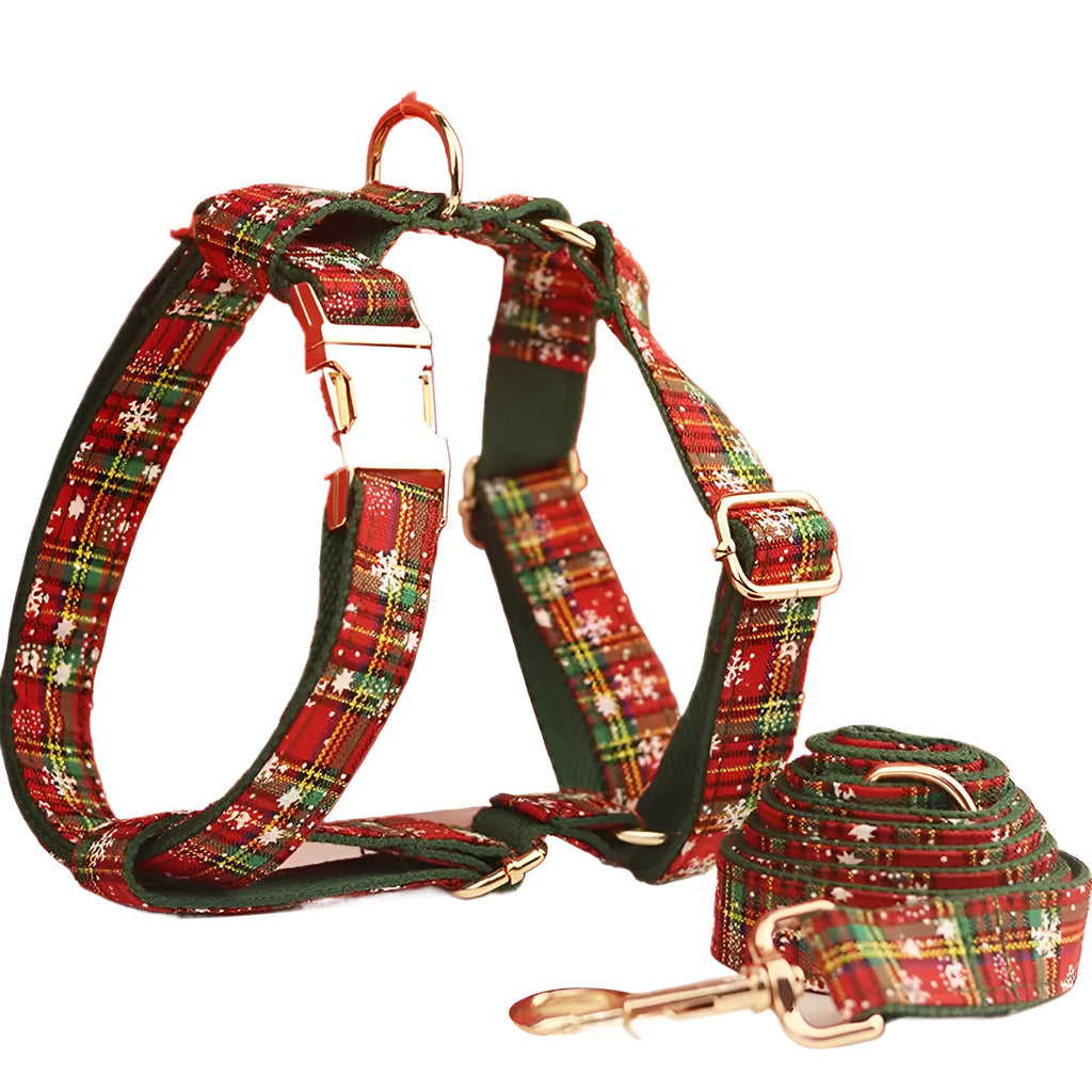 Green snowflake print dog collar set with matching leash, vest, and bow for Christmas