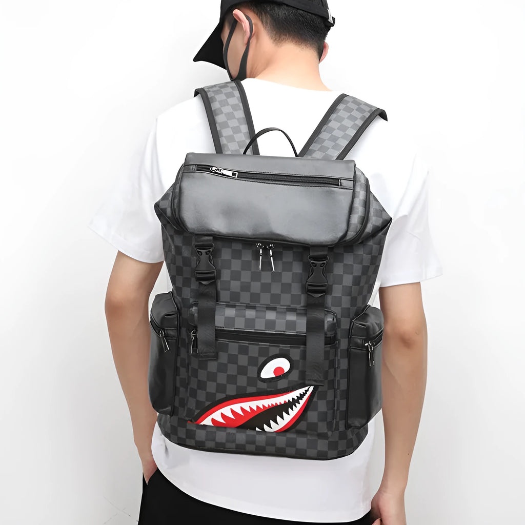 Black checkered print PU leather large capacity backpack with curved shoulder straps.
