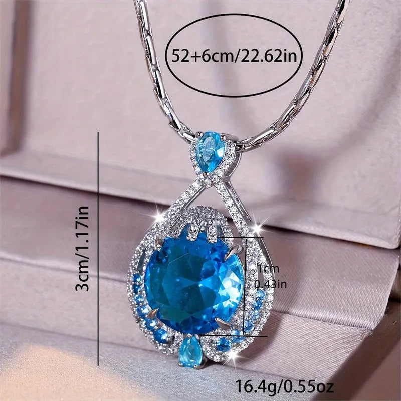 Blue crystal pendant necklace with geometric shape on water wave chain