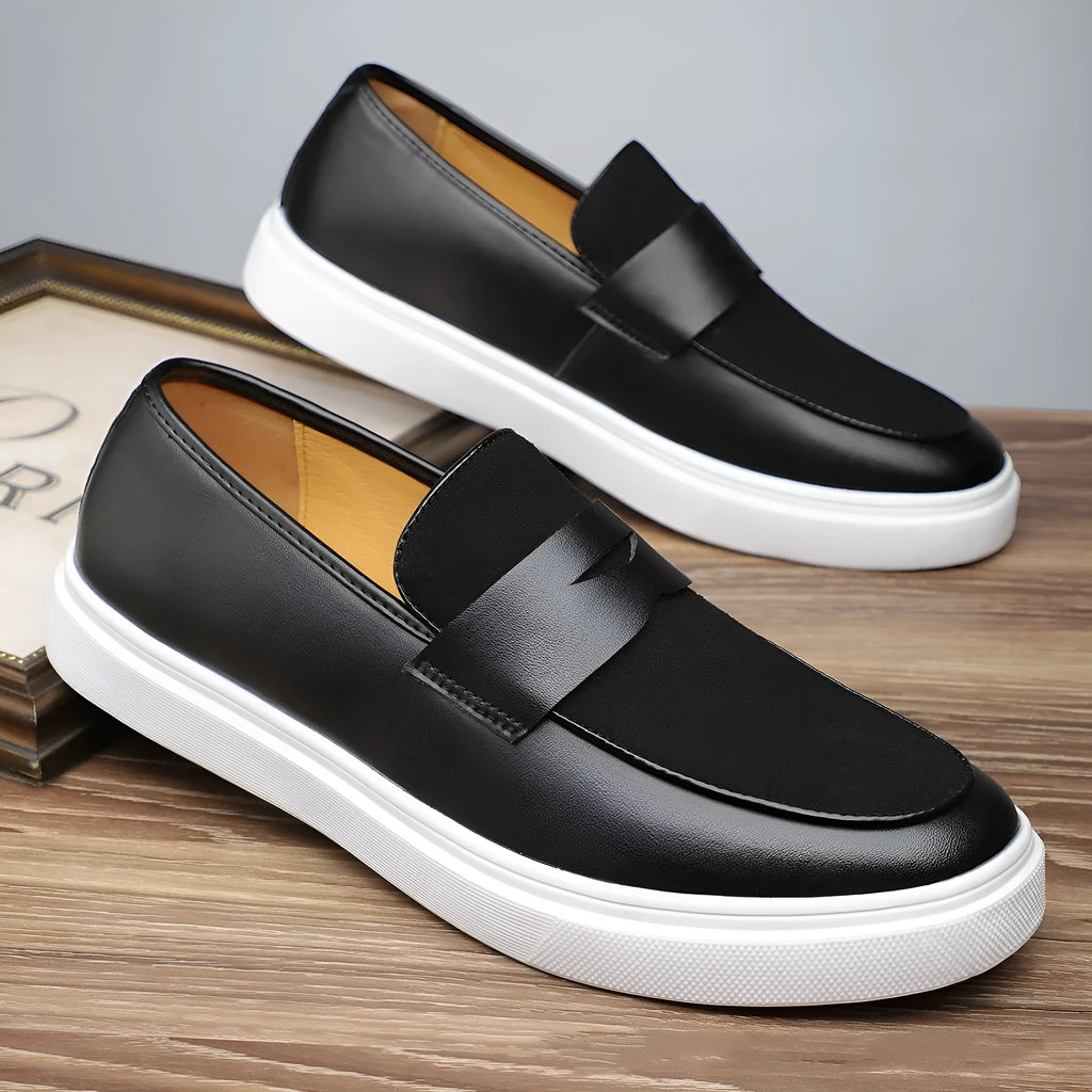 Black men's slip-on casual shoes with tassel detailing and Gommino soles