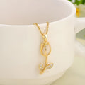 Women's adjustable zircon tulip necklace with copper-plated gold pendant on titanium steel chain.