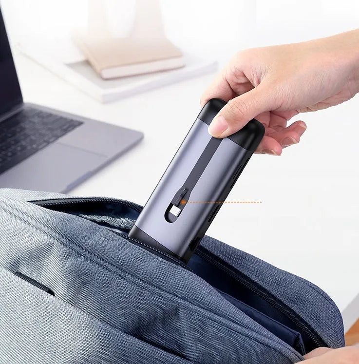 USB-C docking station hub showing HDMI port, USB 3.0 ports, and compact 0.09m design