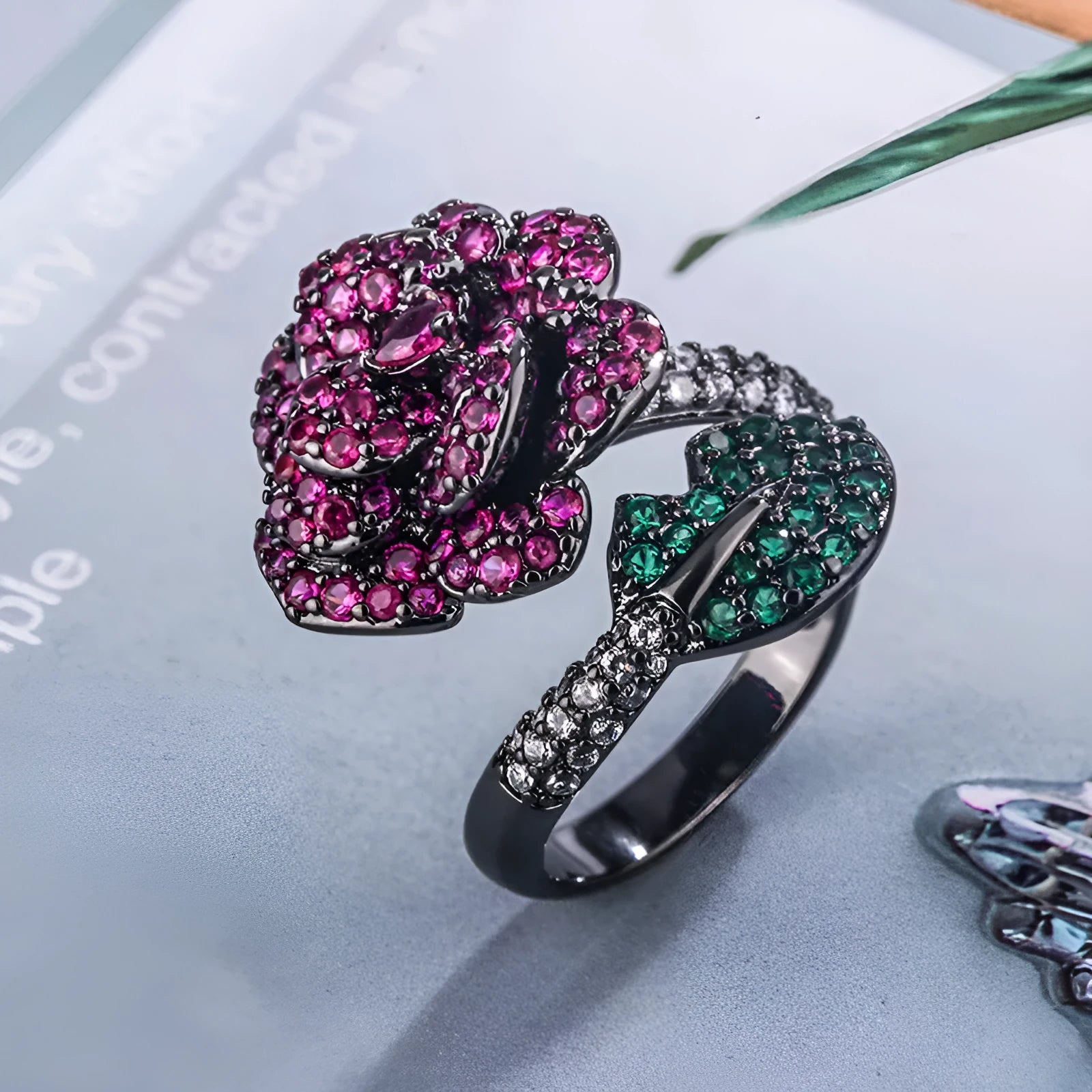 Gold-plated geometric flower ring with red stone for women, black gold colour