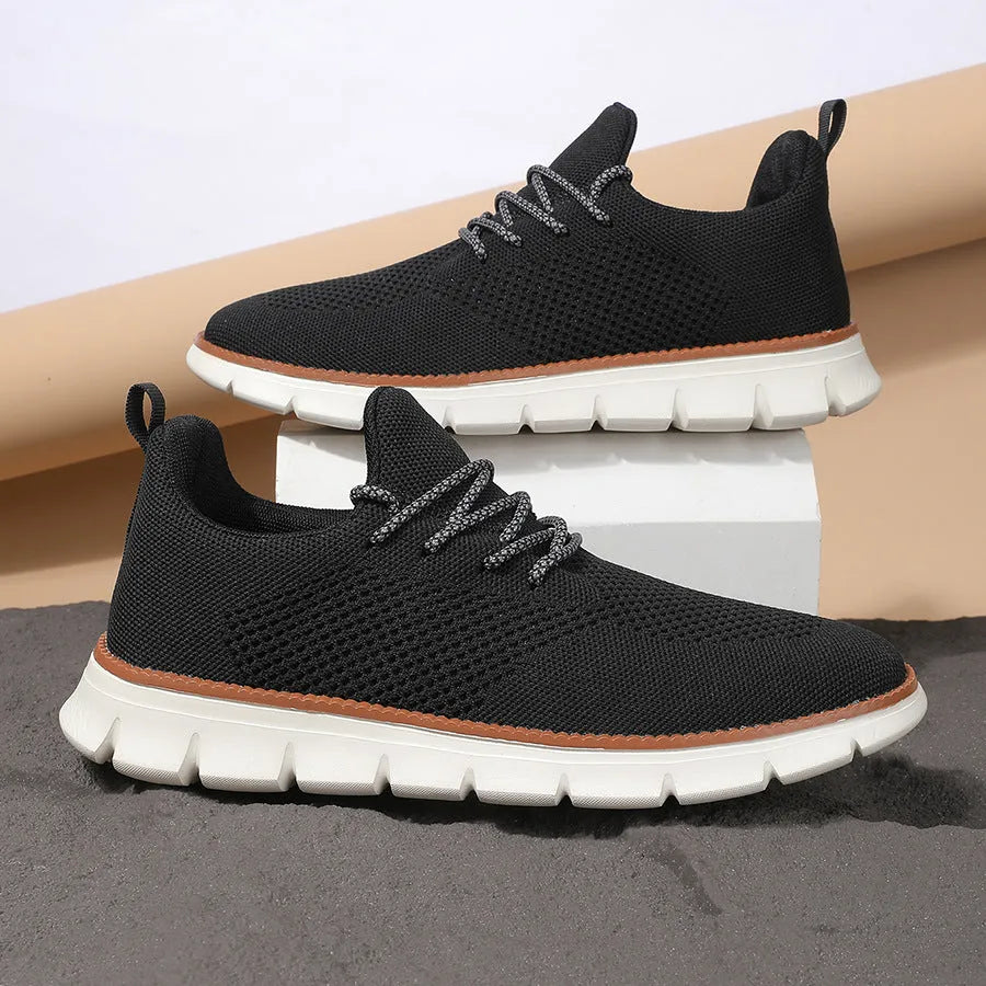 Men's grey and black casual sneakers with mesh fabric upper and round toe design