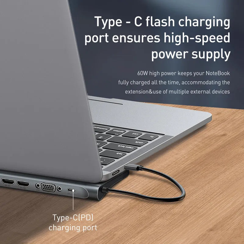 Grey aluminium USB C ten-port docking station with cooling bracket showing HDMI, VGA, and network ports