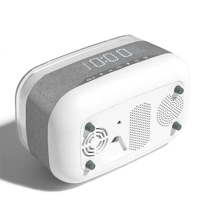 White multifunctional alarm clock with Bluetooth speaker and wireless charging pad