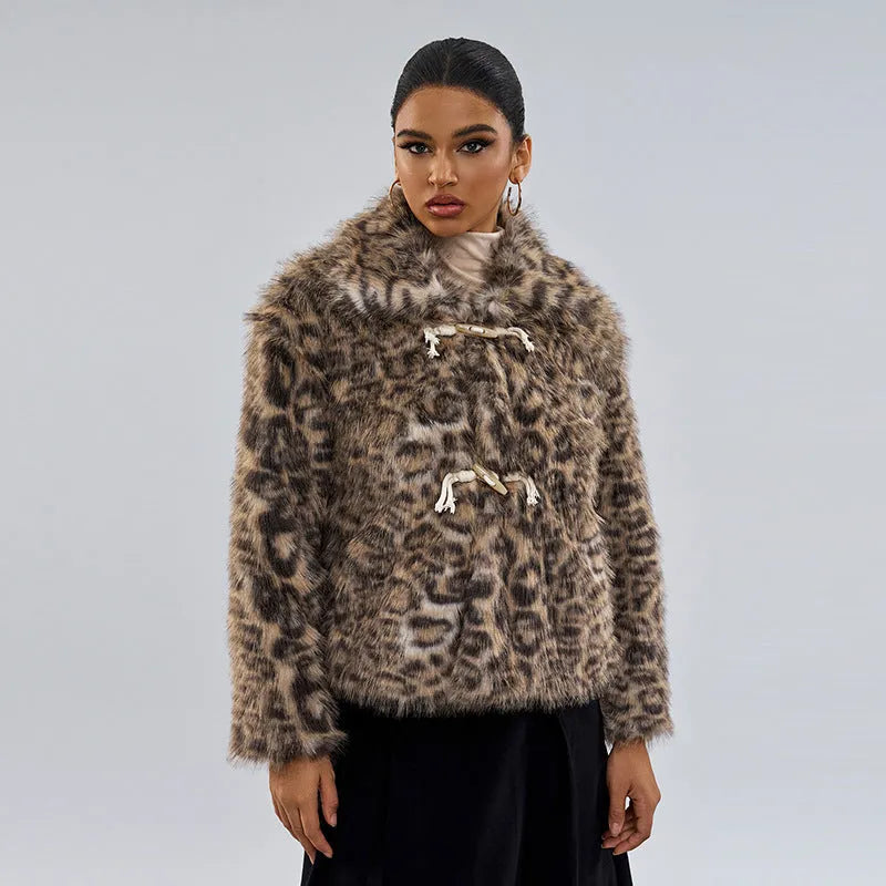 Women's leopard print coat with a buckle on the lapel.