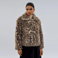 Women's leopard print coat with a buckle on the lapel.