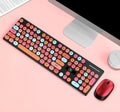 Wireless Punk Manipulator vibrant yellow keyboard and mouse set on a desk.