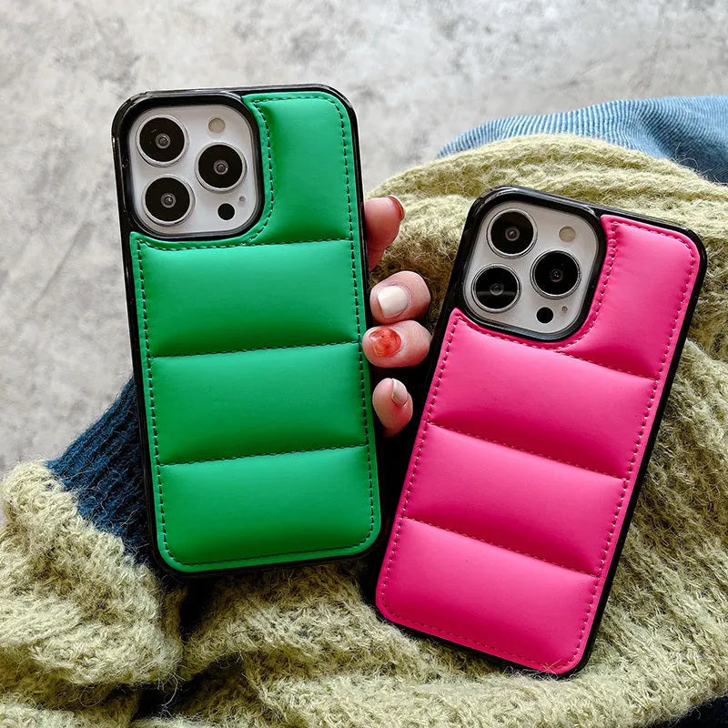 Candy Down Jacket Shape Phone Case for iPhone in black, white, rose red, or green showing puffer texture and dual-material build.