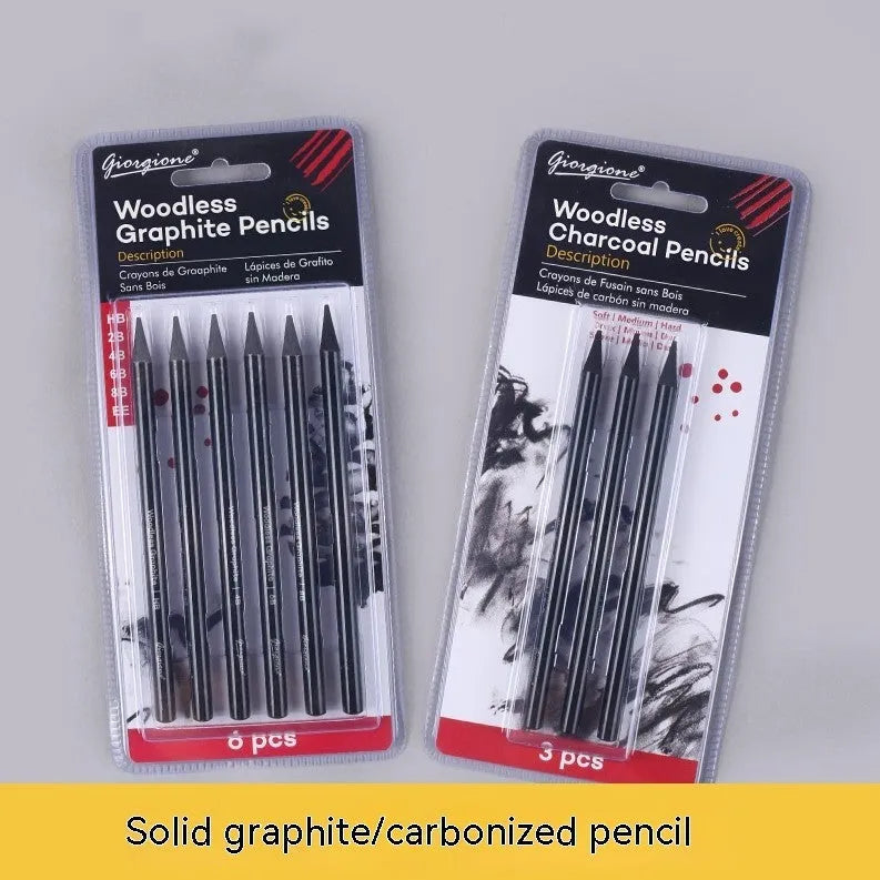Set of six graphite pencils and three carbonized pencils with wooden shells on suction card packaging