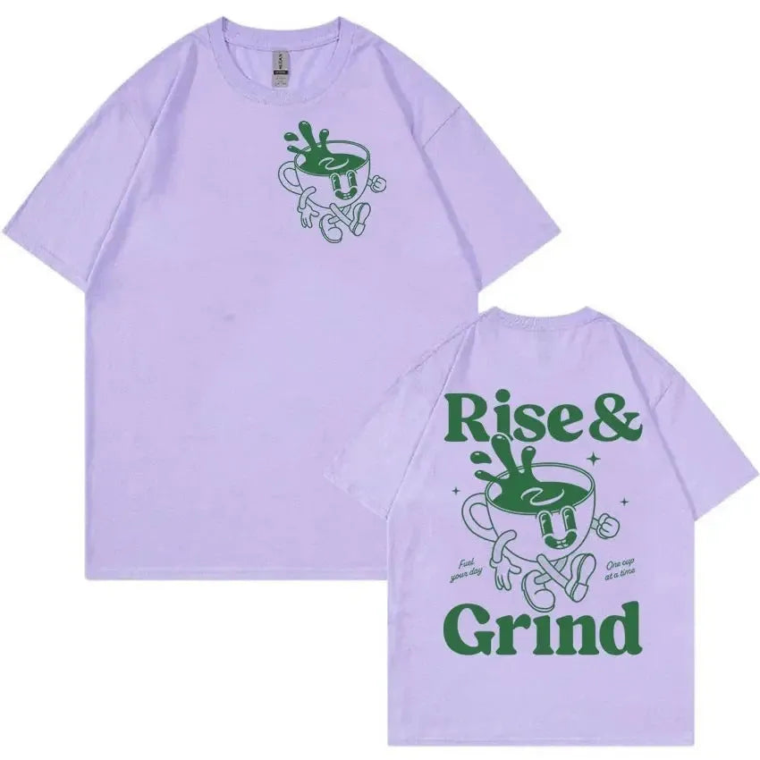 Man wearing a loose grey linen t-shirt with a Rise and Grind Green Coffee cartoon print design.