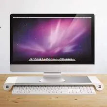Silver and black computer monitor stand with USB charging ports and hidden keyboard storage compartment