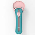 Green and pink silicone pet food spoon with squeezer function for dispensing treats and liquid food to cats and dogs