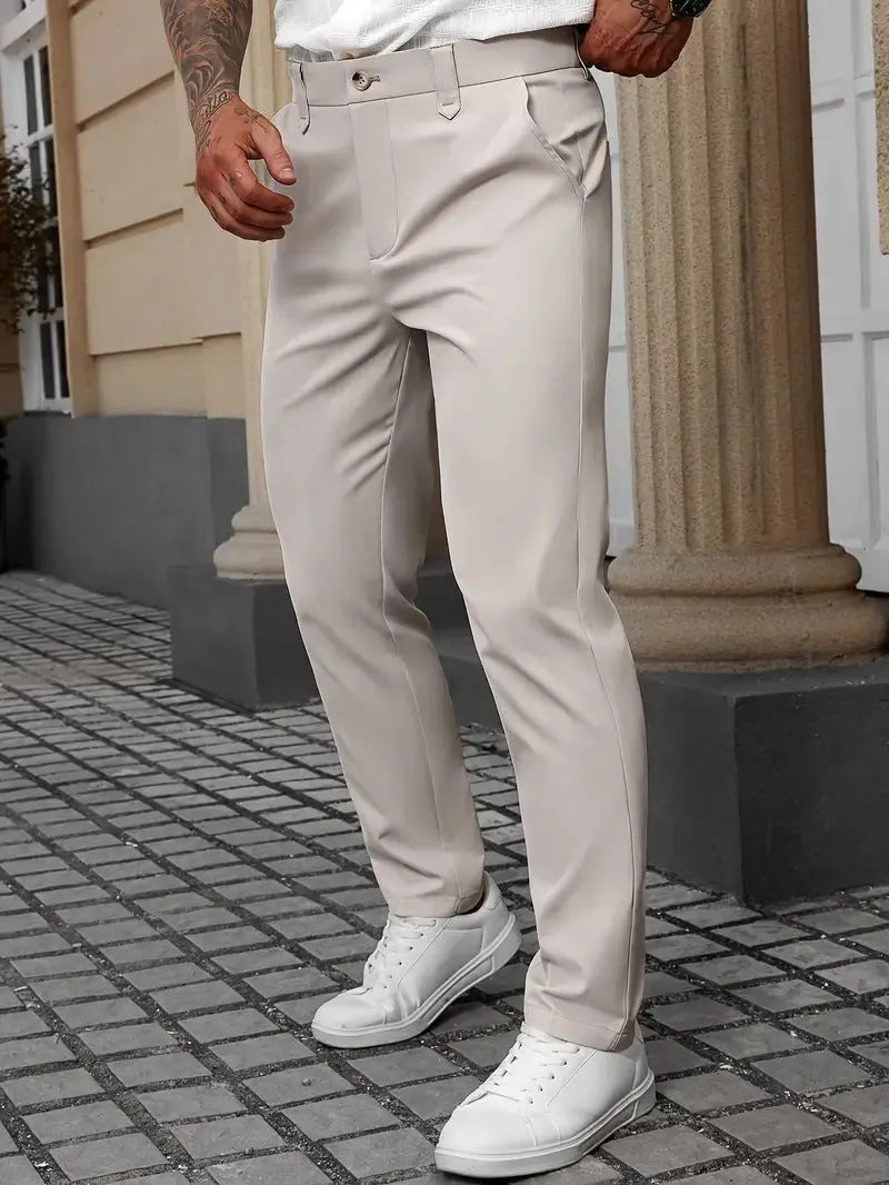 Men's straight leg business casual trousers in solid colours on a hanger.