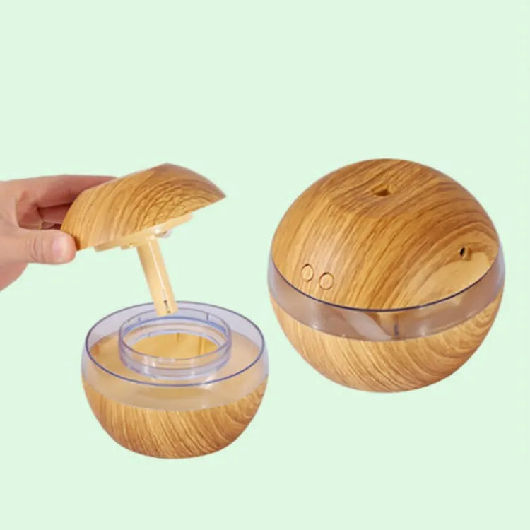 Brown wood grain USB desktop humidifier with 200ml water tank on a desk