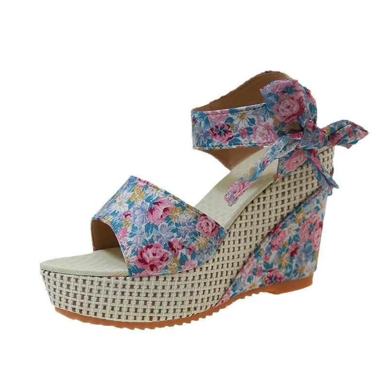 Women's wedge sandals with floral pattern cloth upper and adjustable ankle strap