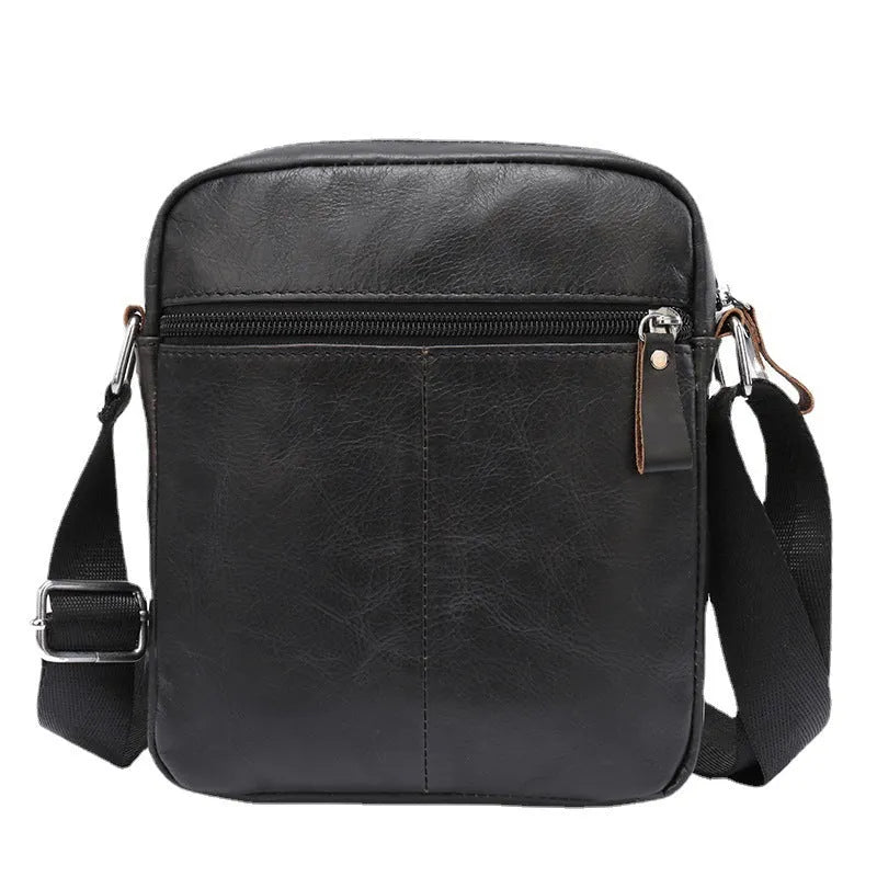 Brown retro style crossbody leather messenger bag shown from the front.